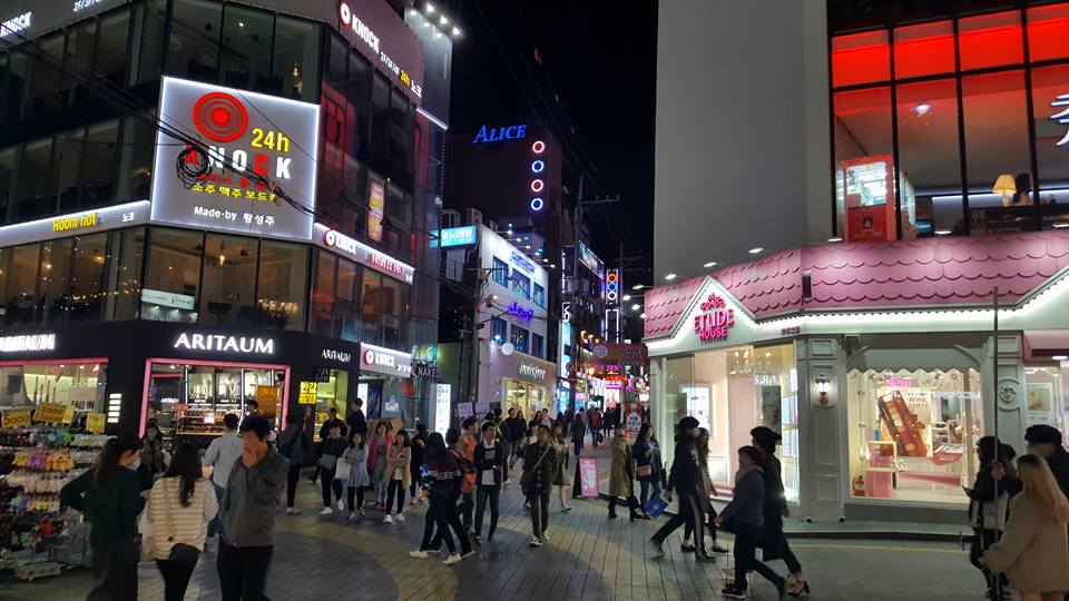 storefronts in hongdae at night